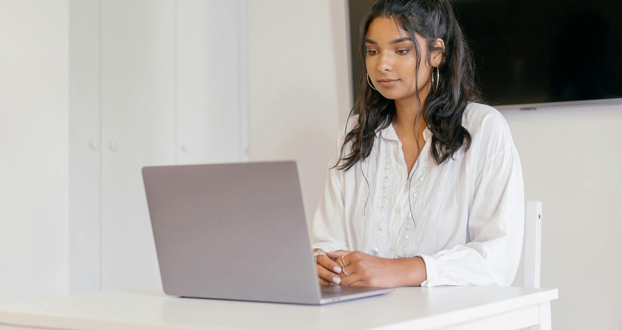 Female Student on Laptop