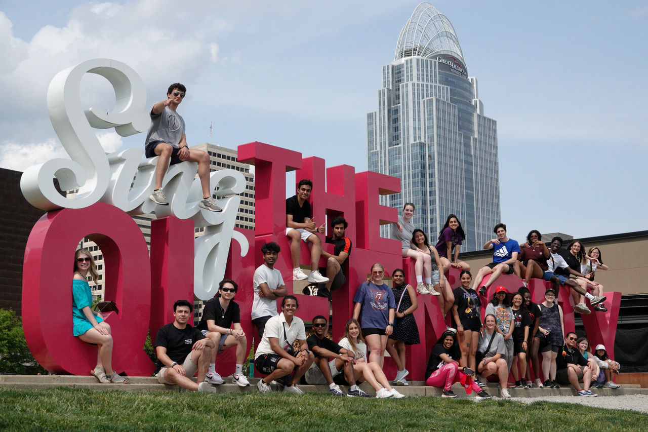 Student Orientation Leaders (SOLs) tour downtown (Findlay Market, Sing the Queen City sign at the Banks, Smale Riverfront Park)