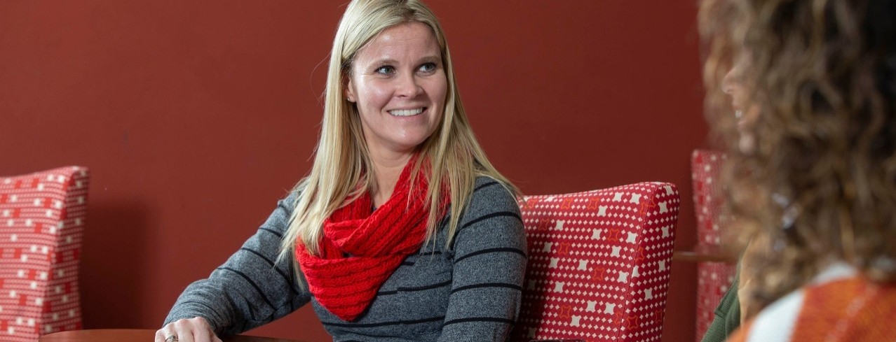 Image of an educator smiling.