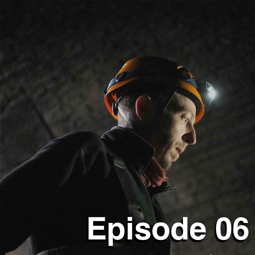 Joe Johnson in a cave with Episode 6 written in bottom right corner