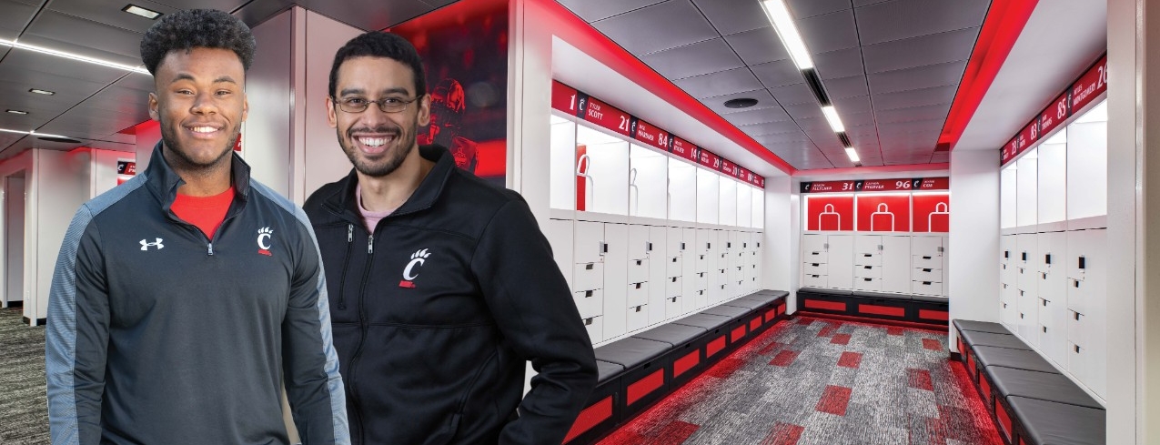 A student in a mask works in a University of Cincinnati lab