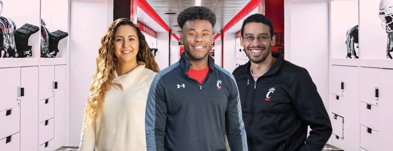 Masked students working collaboratively in a University of Cincinnati lab