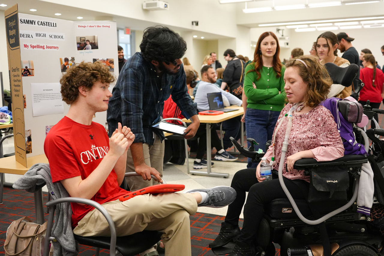 Students talking at presentations